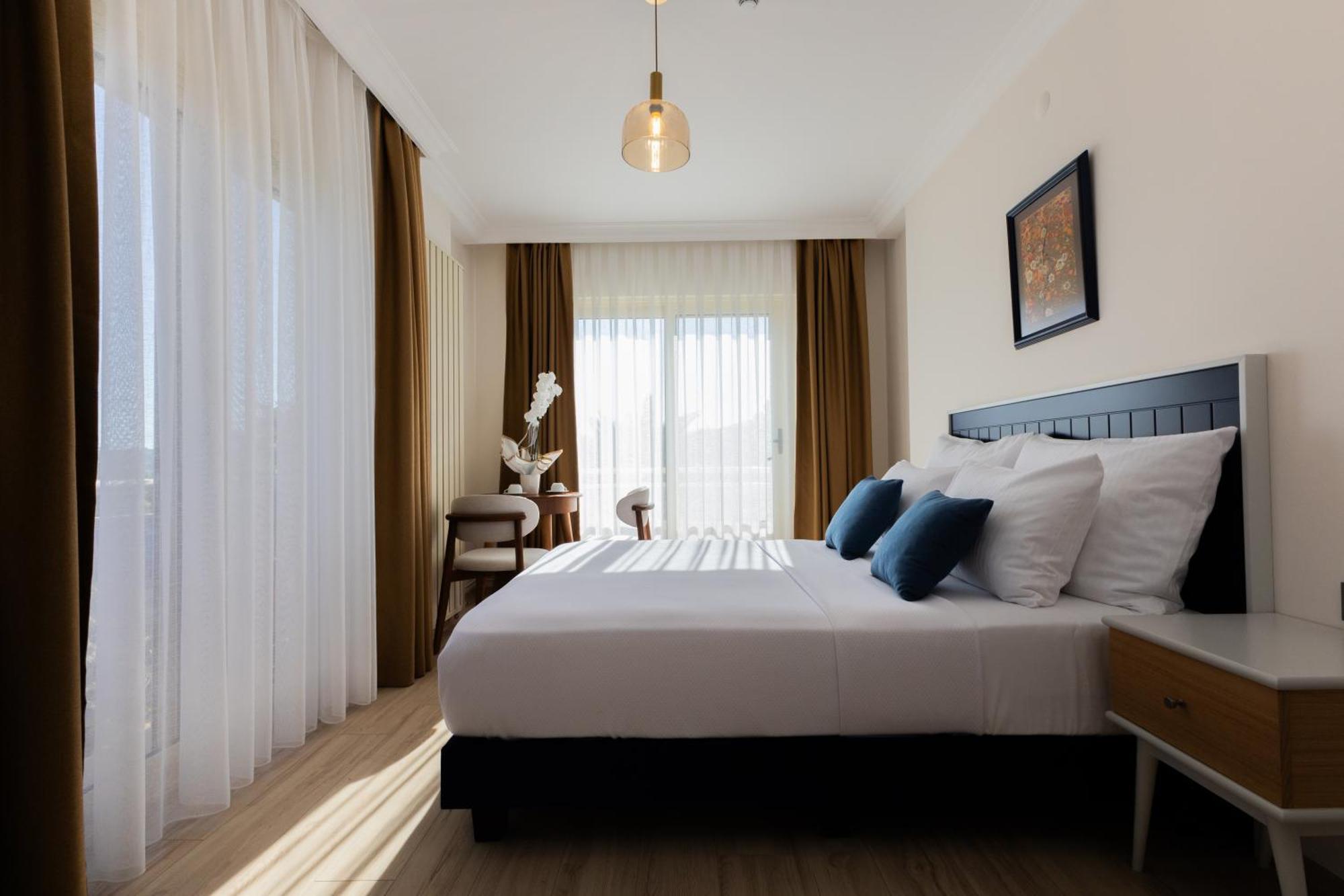 Kamer Exclusive Hotel & Suites Кешме Экстерьер фото