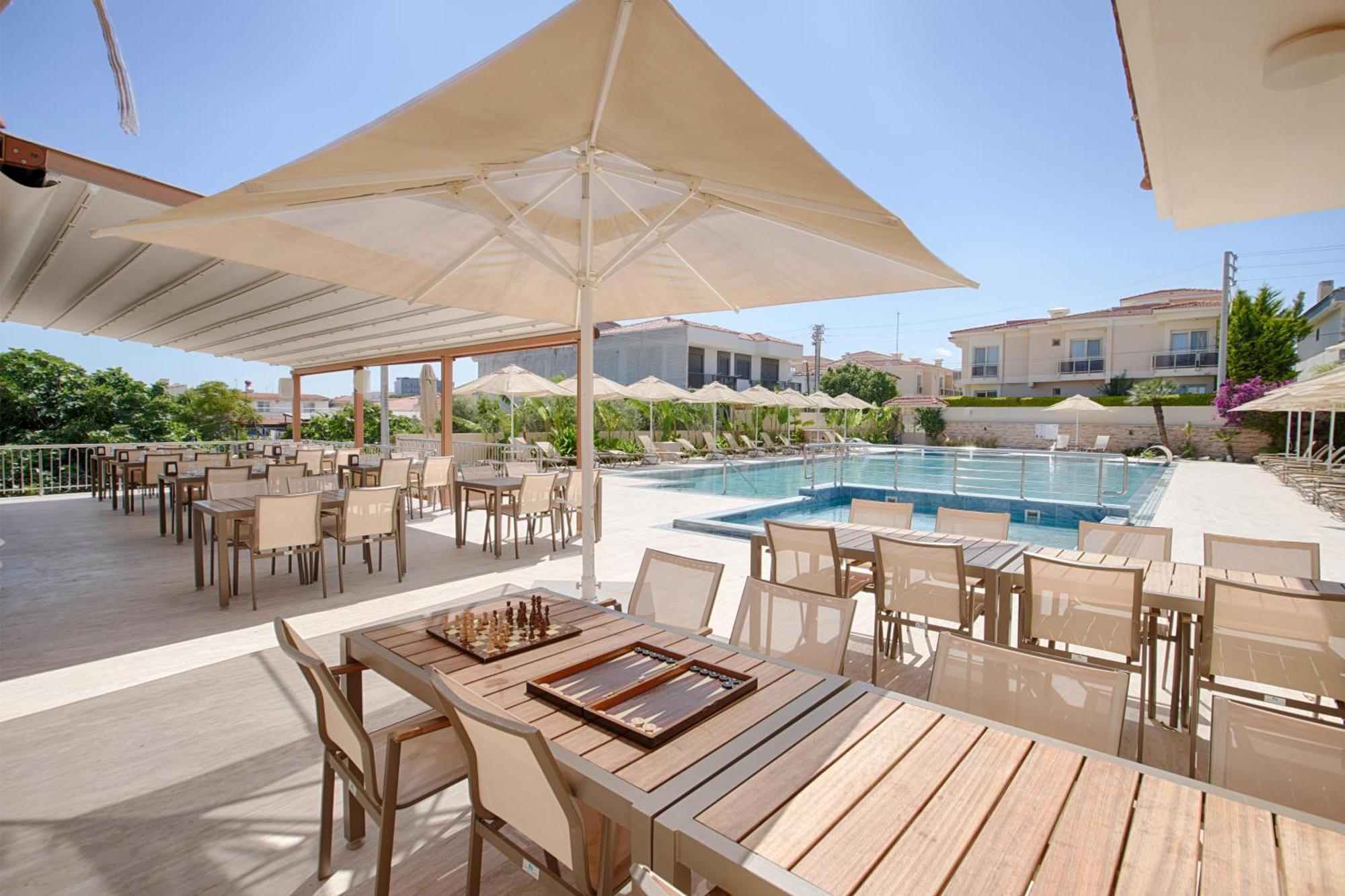 Kamer Exclusive Hotel & Suites Кешме Экстерьер фото