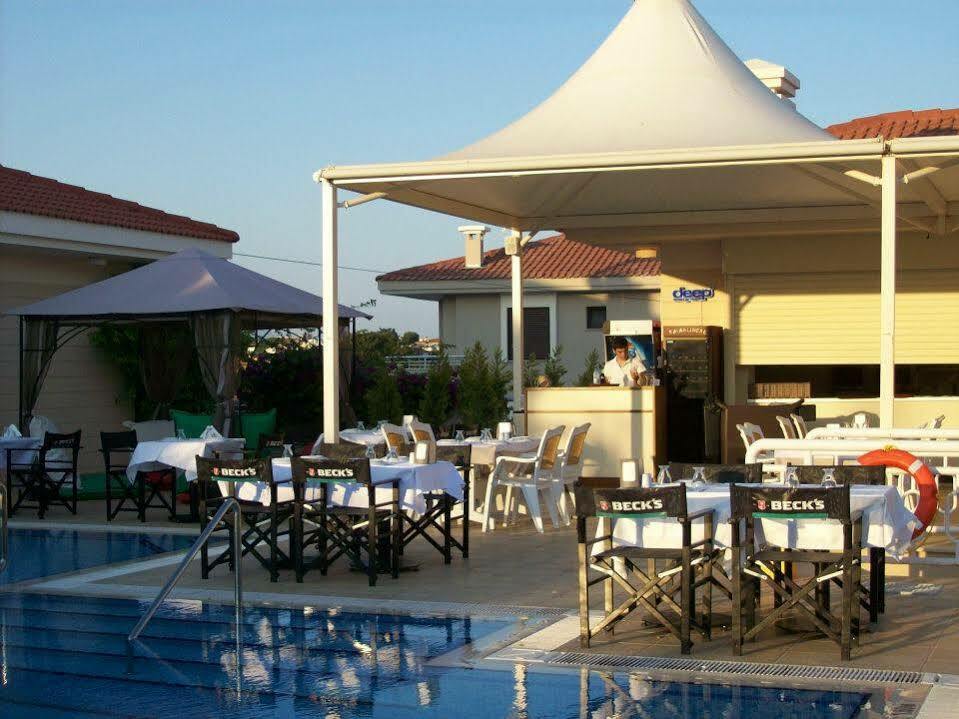 Kamer Exclusive Hotel & Suites Кешме Экстерьер фото